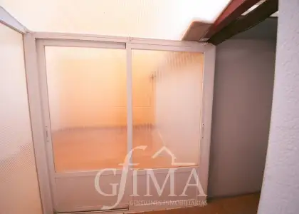 Casa adosada en venta con patio y garaje amplio en Argamasilla de Alba
